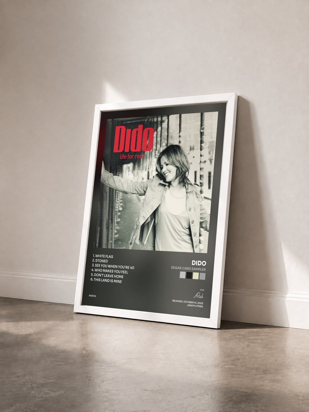 #blanc Tableau de l'album Edgar Card Sampler de Dido vu de trois quarts, cadre blanc