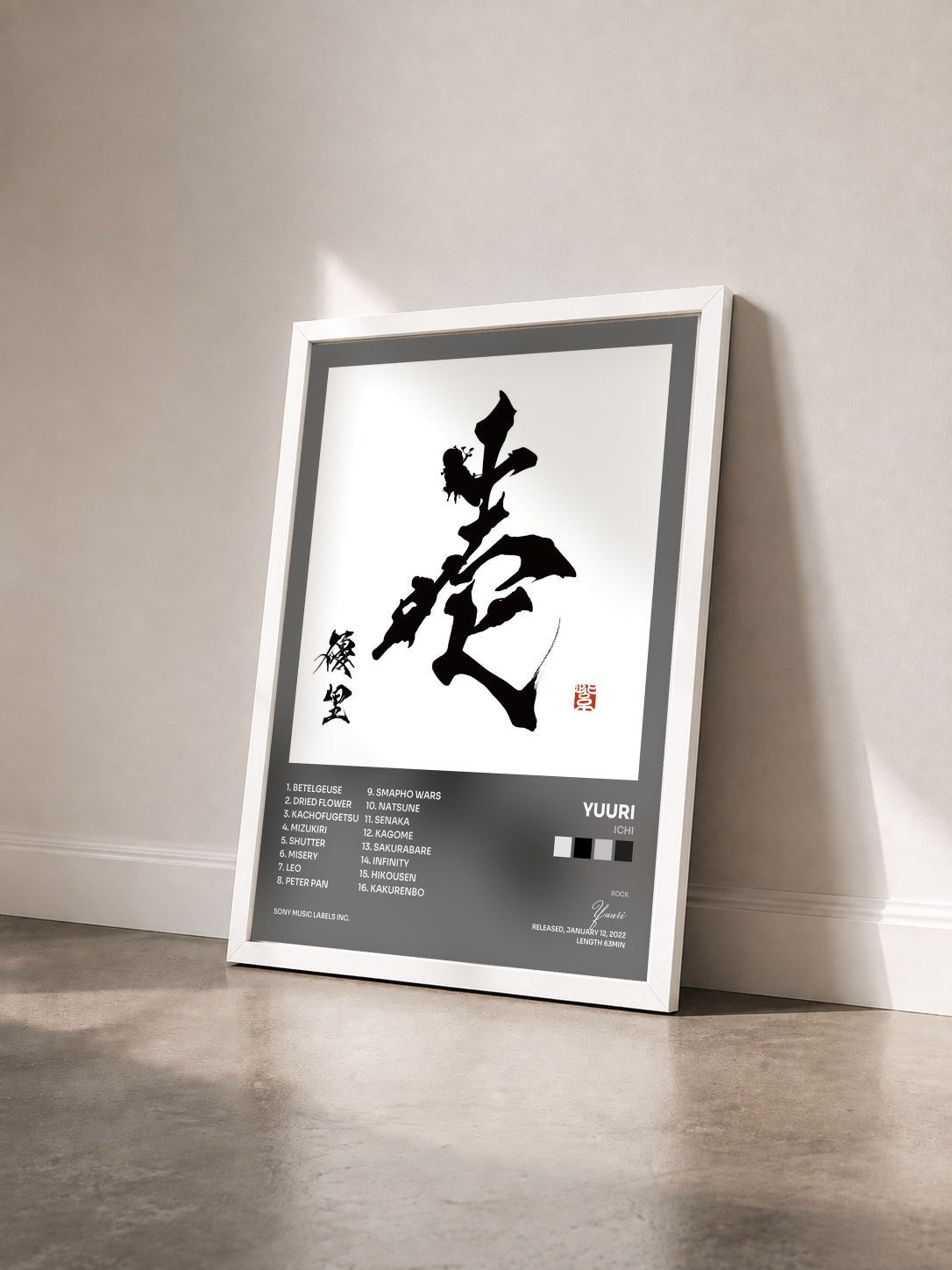 #blanc Tableau de l'album Ichi de Yuuri vu de trois quarts, cadre blanc