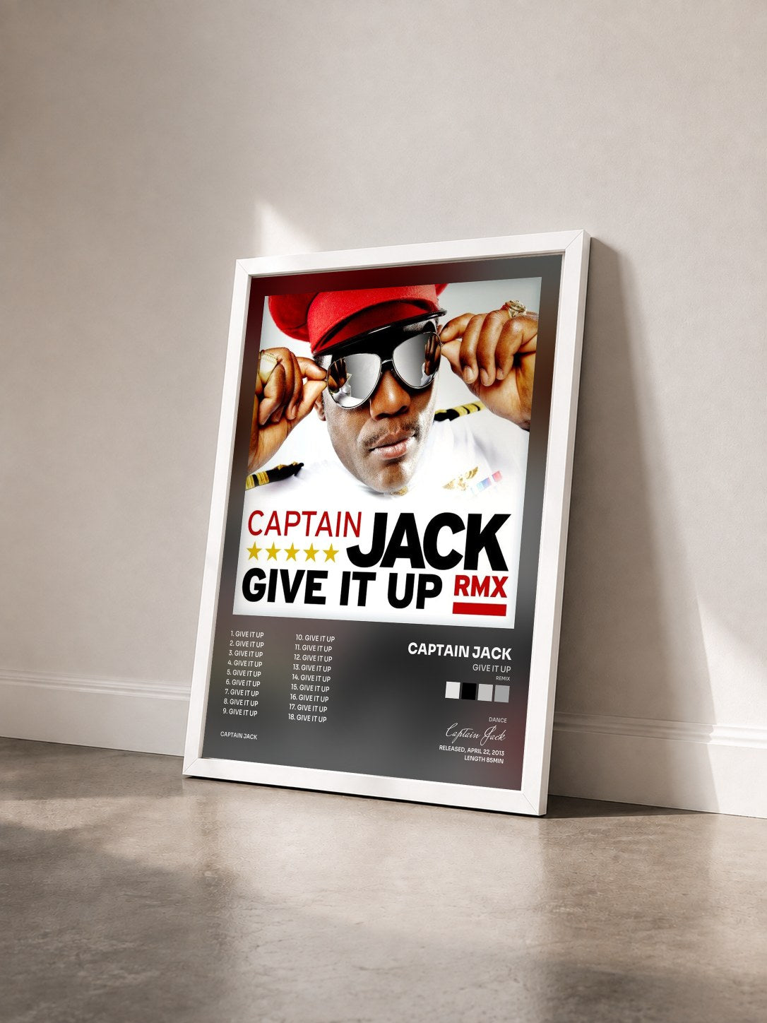 #blanc Tableau de l'album Give It Up (Remix) de Captain Jack vu de trois quarts, cadre blanc
