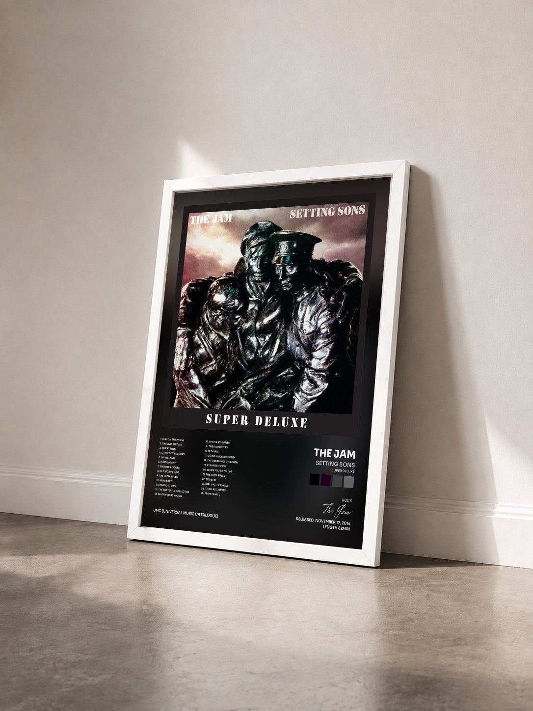 #blanc Tableau de l'album Setting Sons (Super Deluxe) de The Jam vu de trois quarts, cadre blanc