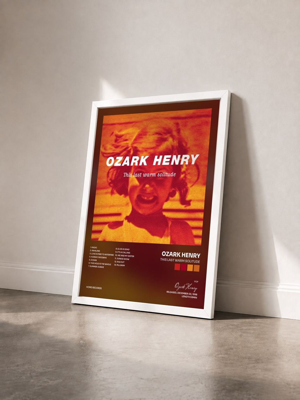 #blanc Tableau de l'album This Last Warm Solitude de Ozark Henry vu de trois quarts, cadre blanc
