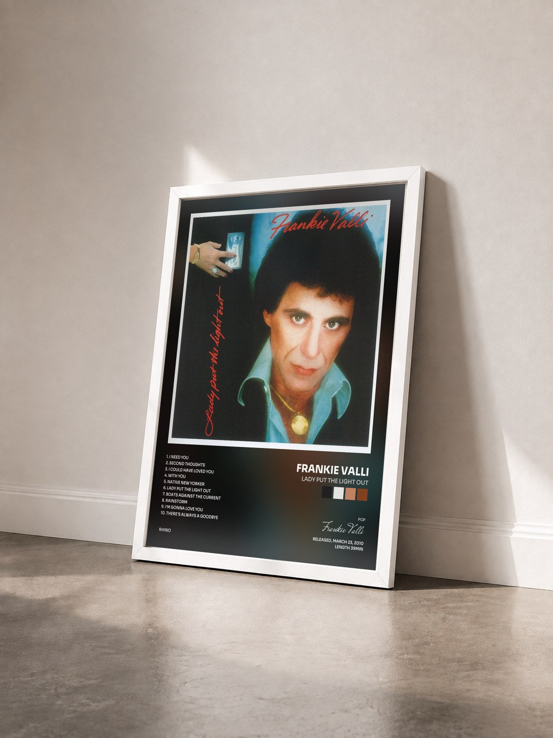 #blanc Tableau de l'album Lady Put The Light Out de Frankie Valli vu de trois quarts, cadre blanc