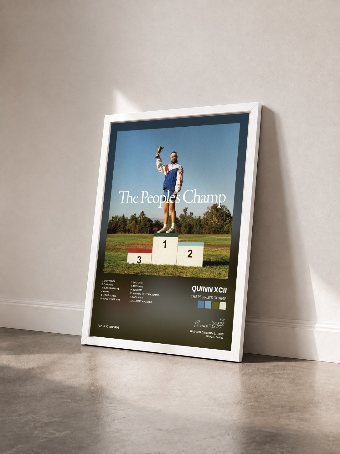 #blanc Tableau de l'album The People's Champ de Quinn XCII vu de trois quarts, cadre blanc