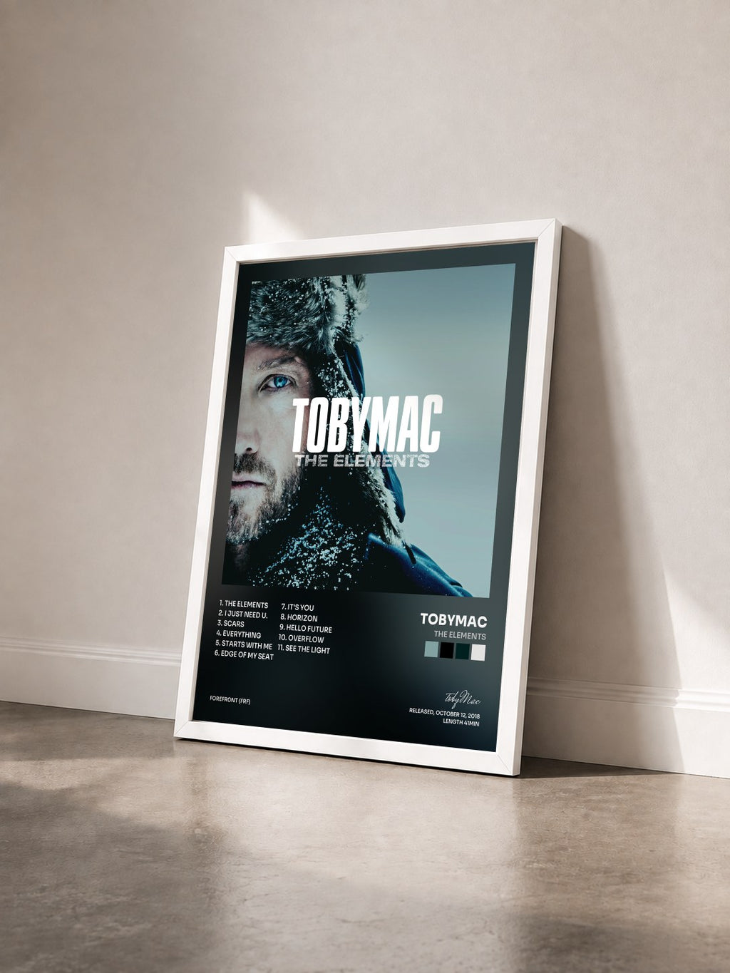 #blanc The Elements by tobyMac as a framed art print seen at an angle, white frame