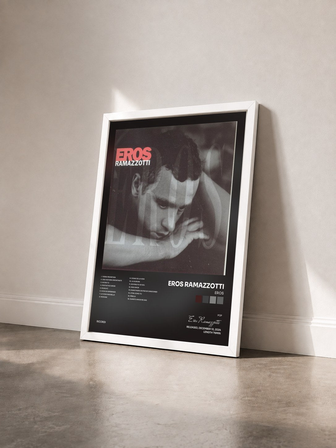 #blanc Tableau de l'album Eros de Eros Ramazzotti vu de trois quarts, cadre blanc