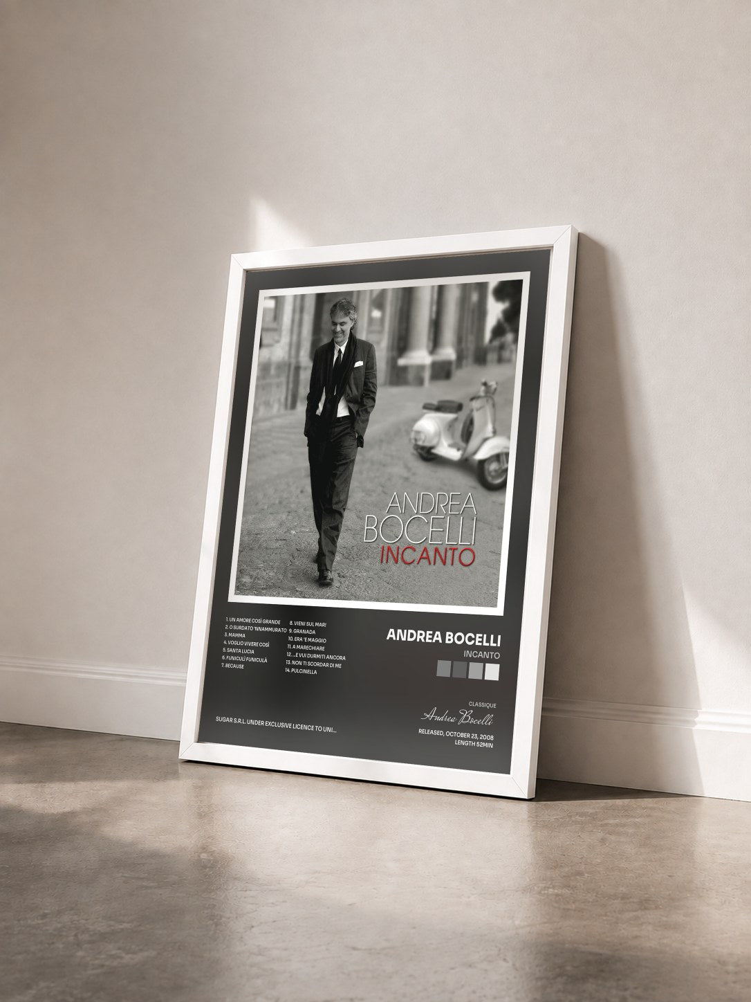 #blanc Tableau de l'album Incanto de Andrea Bocelli vu de trois quarts, cadre blanc