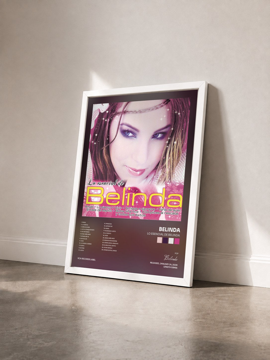 #blanc Tableau de l'album Lo Esencial de Belinda de Belinda vu de trois quarts, cadre blanc
