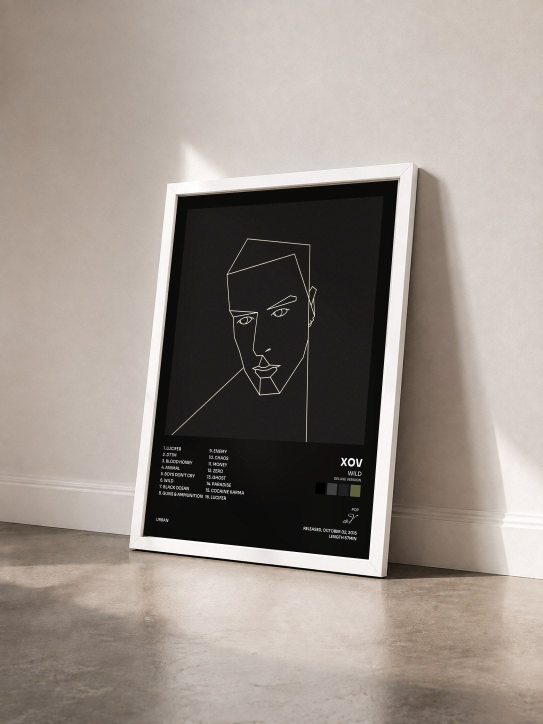 #blanc Tableau de l'album Wild (Deluxe Version) de xoV vu de trois quarts, cadre blanc