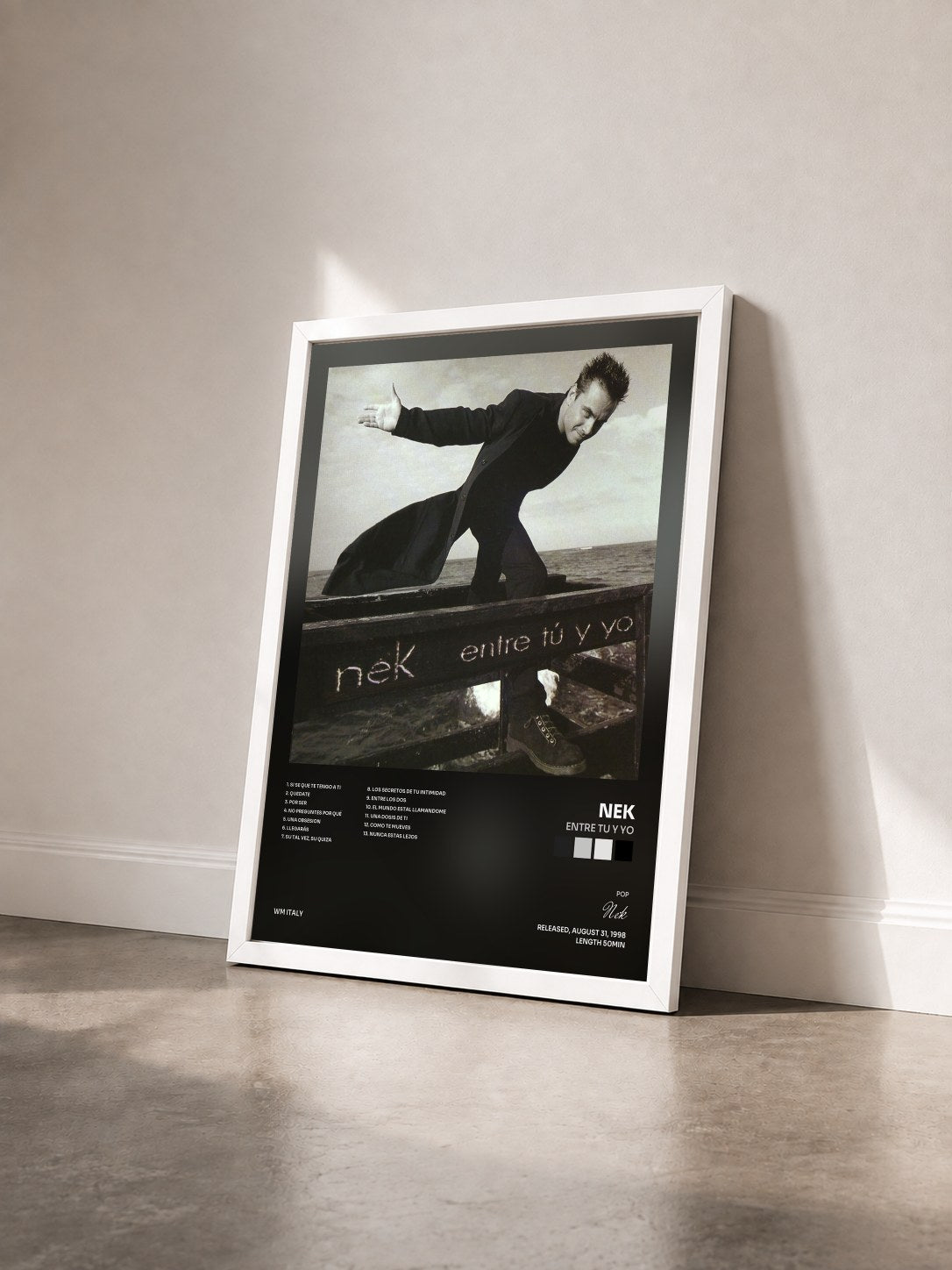 #blanc Tableau de l'album Entre tu y yo de Nek vu de trois quarts, cadre blanc