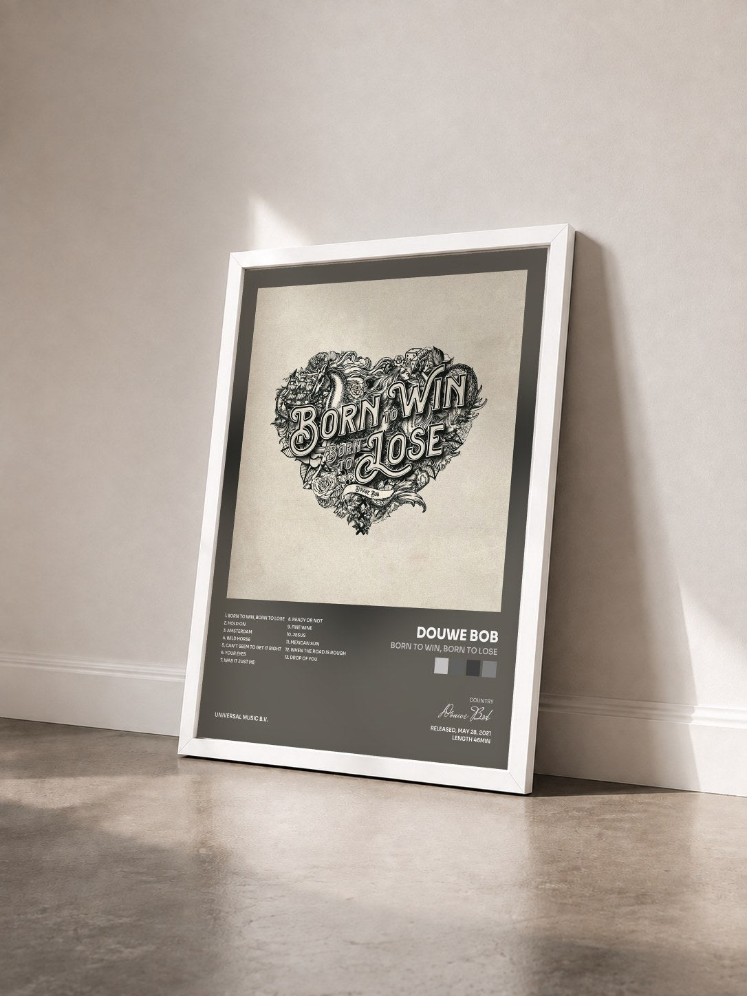 #blanc Tableau de l'album Born To Win, Born To Lose de Douwe Bob vu de trois quarts, cadre blanc