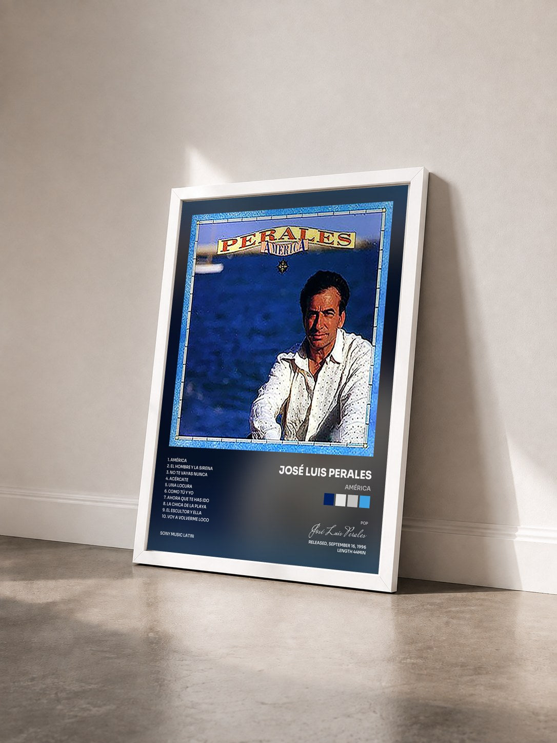 #blanc Tableau de l'album América de José Luis Perales vu de trois quarts, cadre blanc