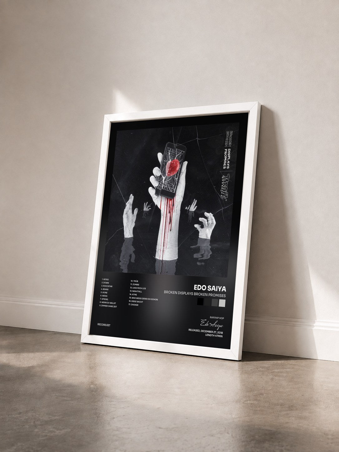 #blanc Tableau de l'album Broken Displays Broken Promises de Edo Saiya vu de trois quarts, cadre blanc