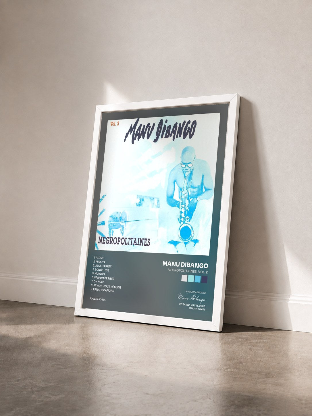 #blanc Tableau de l'album Negropolitaines, Vol. 2 de Manu Dibango vu de trois quarts, cadre blanc