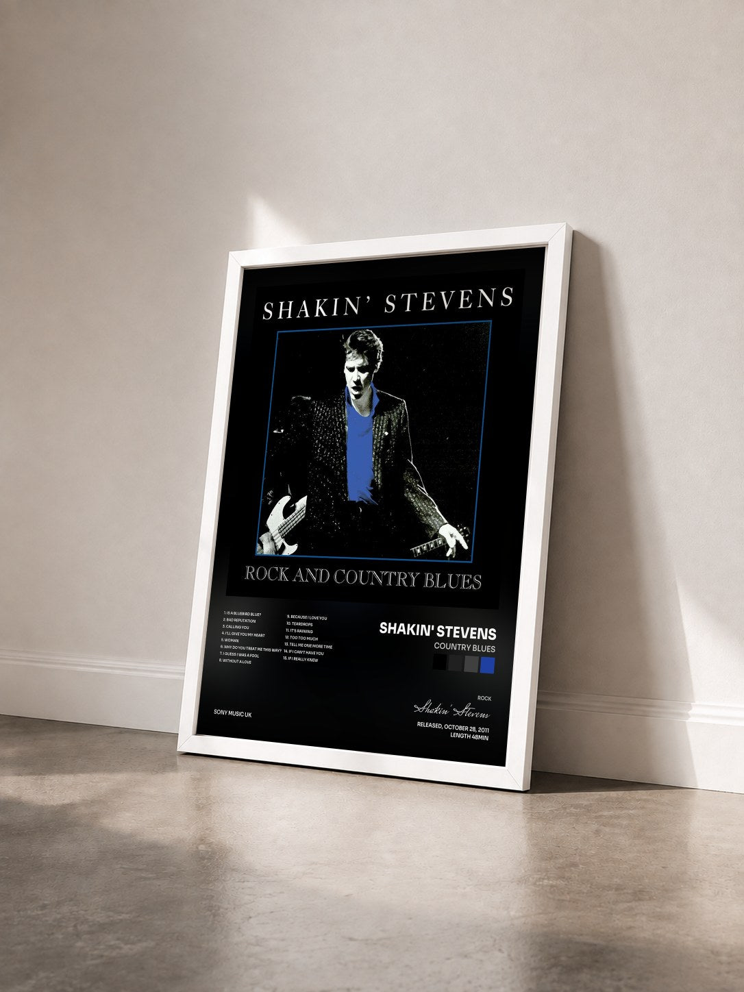 #blanc Tableau de l'album Country Blues de Shakin' Stevens vu de trois quarts, cadre blanc