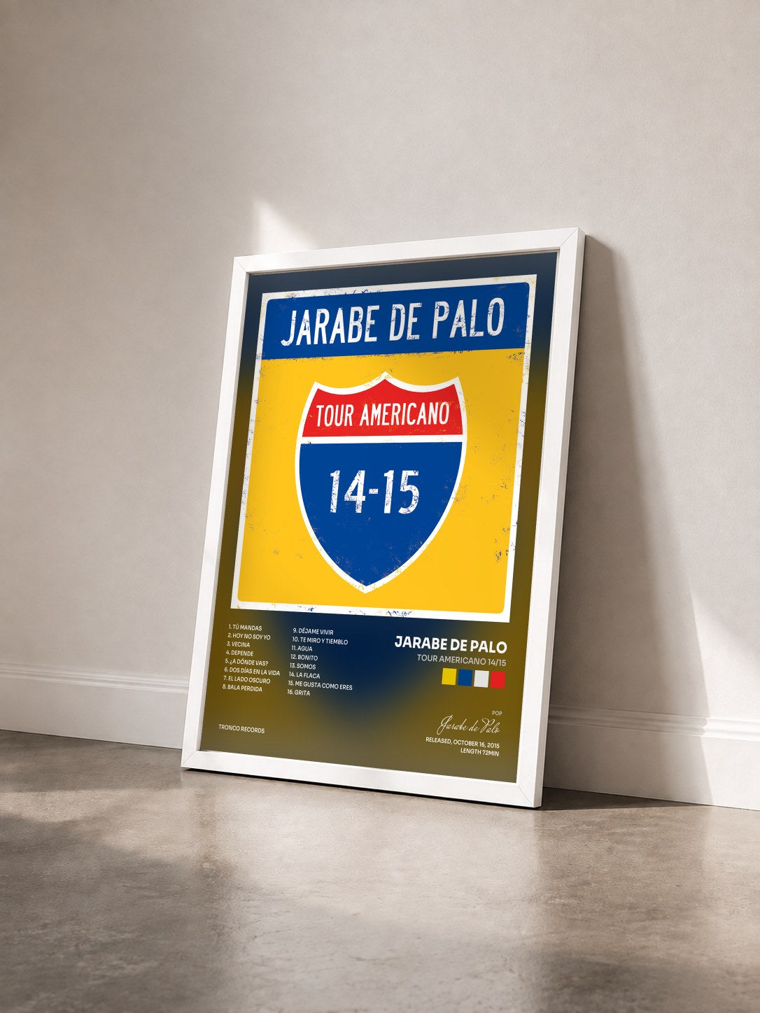#blanc Tableau de l'album Tour Americano 14/15 de Jarabe de Palo vu de trois quarts, cadre blanc