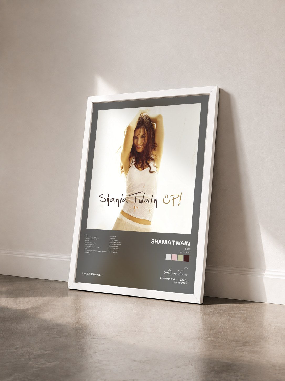 #blanc Tableau de l'album Up! (Red Album) de Shania Twain vu de trois quarts, cadre blanc