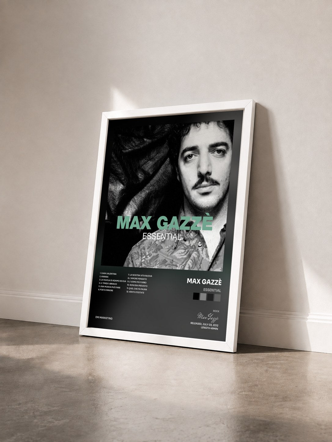 #blanc Tableau de l'album Essential de Max Gazzè vu de trois quarts, cadre blanc