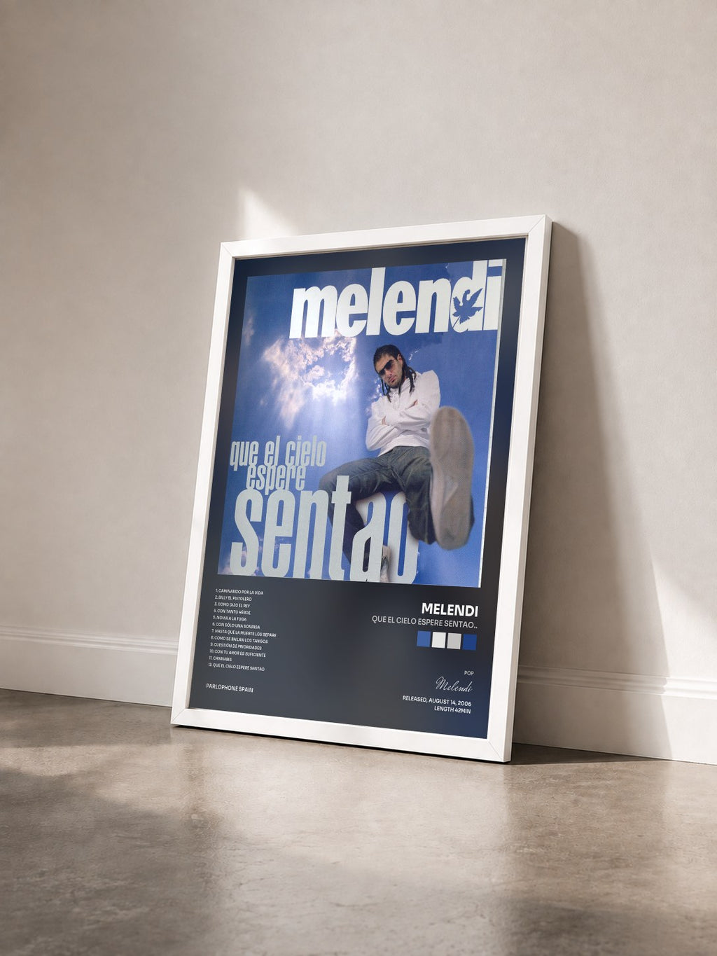 #blanc Que El Cielo Espere Sentao.. by Melendi as a framed art print seen at an angle, white frame