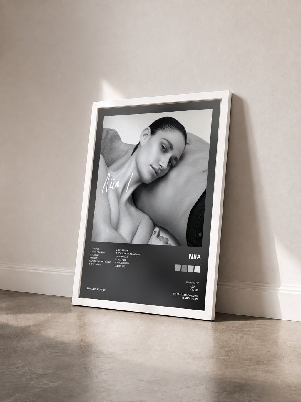 #blanc I by Niia as a framed art print seen at an angle, white frame