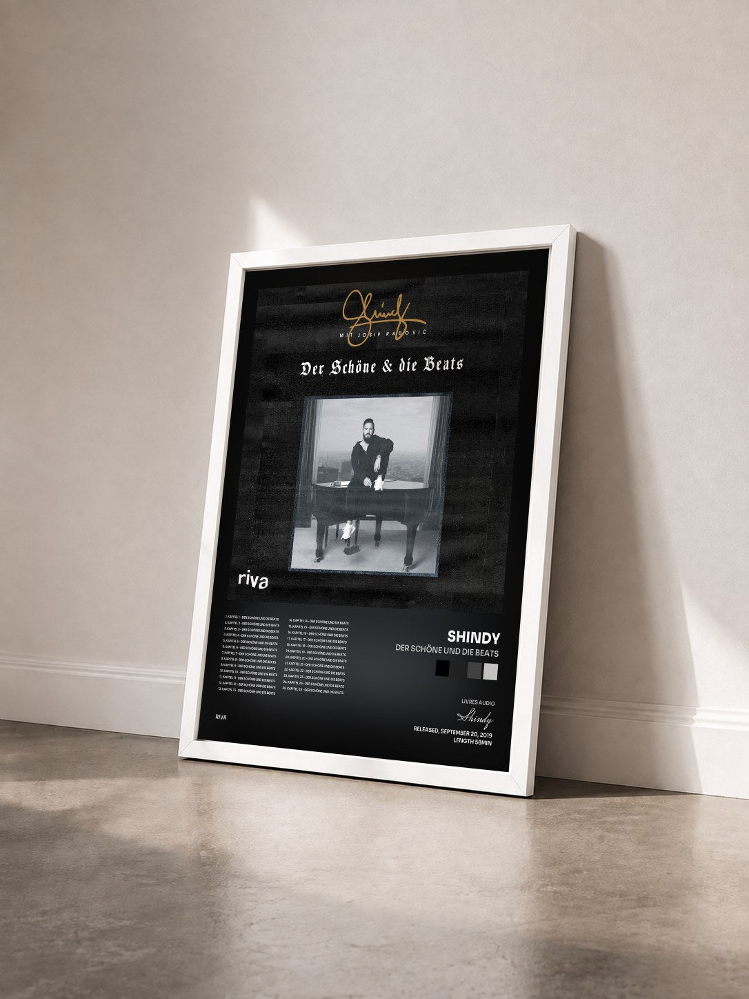 #blanc Tableau de l'album Der Schöne und die Beats de Shindy vu de trois quarts, cadre blanc