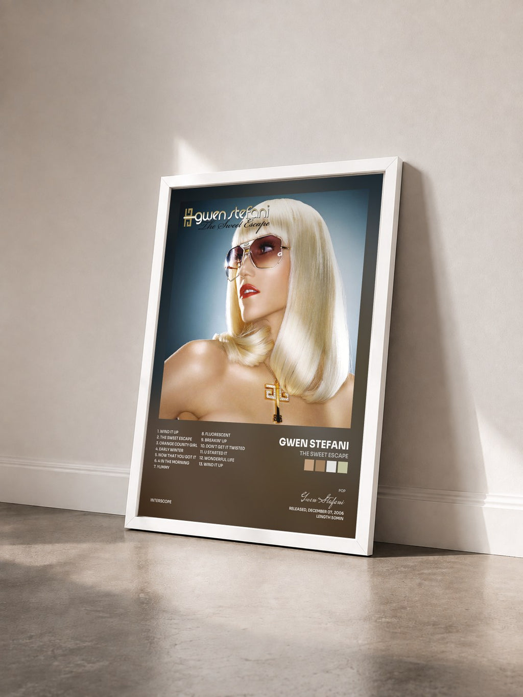 #blanc Tableau de l'album The Sweet Escape de Gwen Stefani vu de trois quarts, cadre blanc
