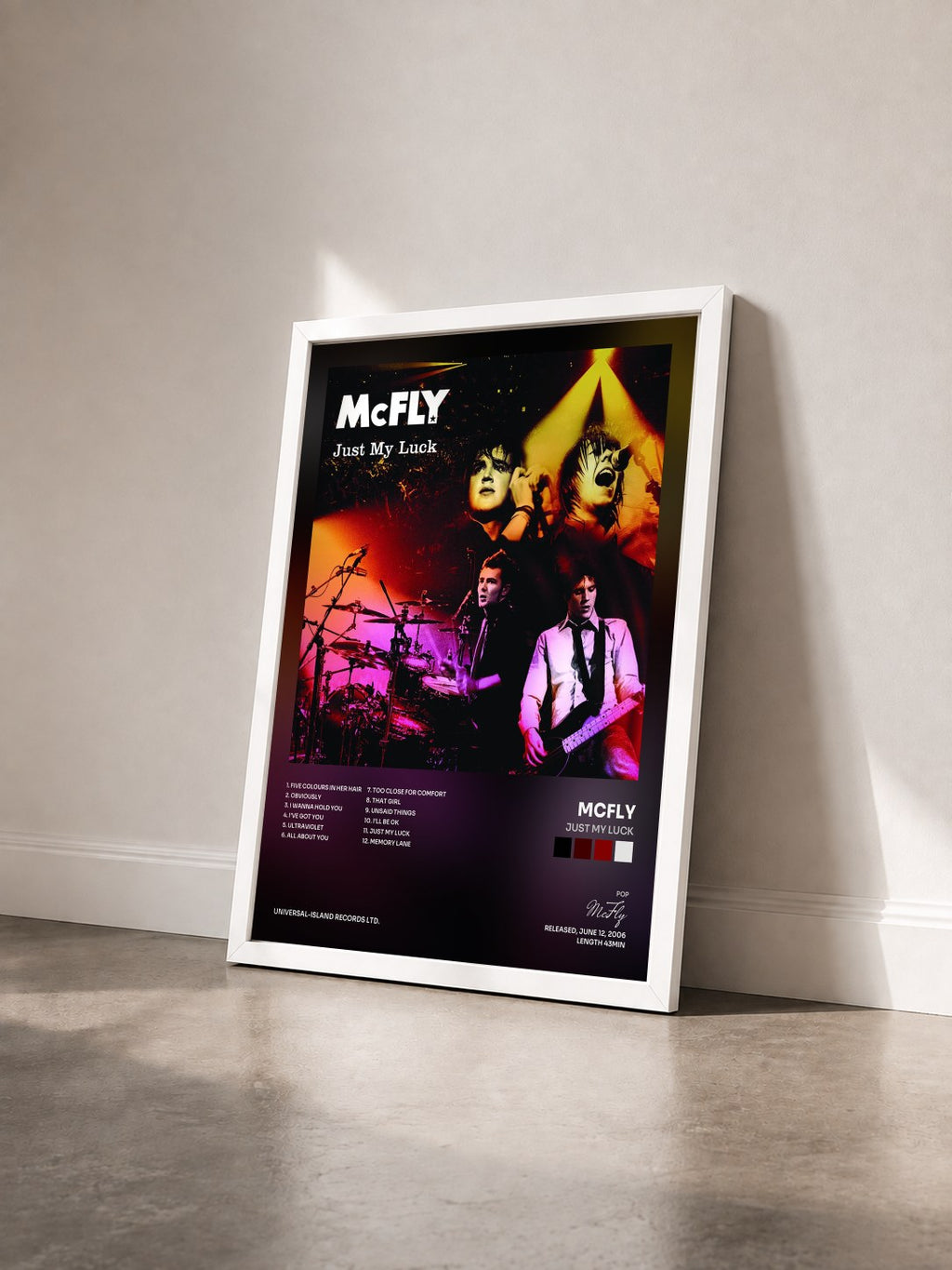 #blanc Tableau de l'album Just My Luck de McFly vu de trois quarts, cadre blanc