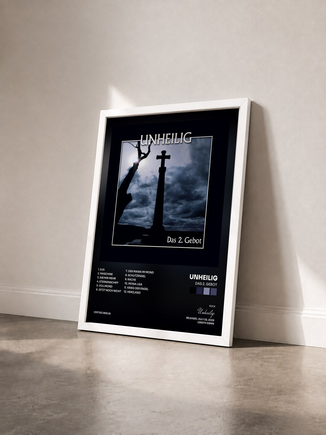 #blanc Tableau de l'album Das 2. Gebot de Unheilig vu de trois quarts, cadre blanc