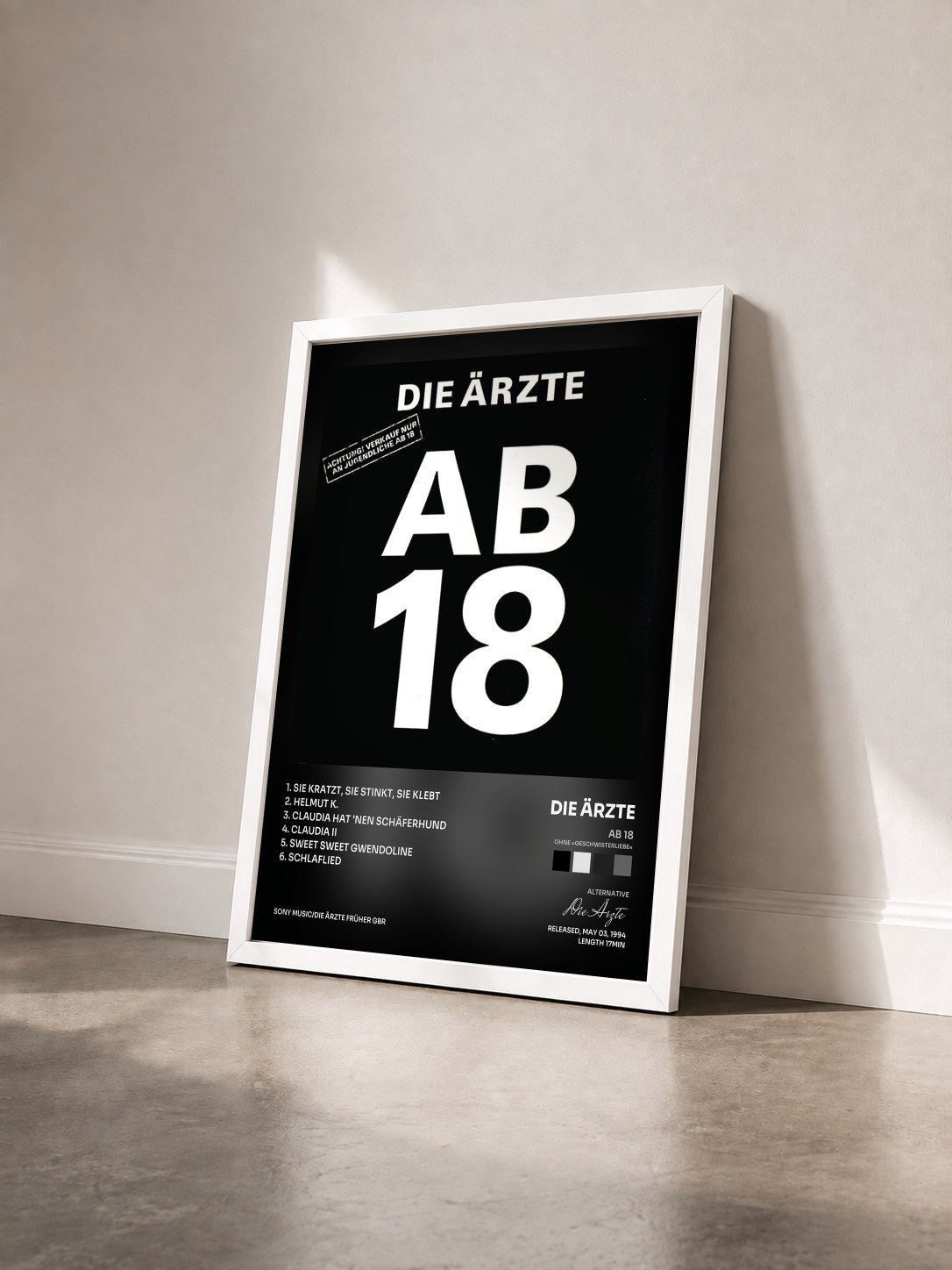 #blanc Tableau de l'album Ab 18 (Ohne »Geschwisterliebe«) de Die Ärzte vu de trois quarts, cadre blanc