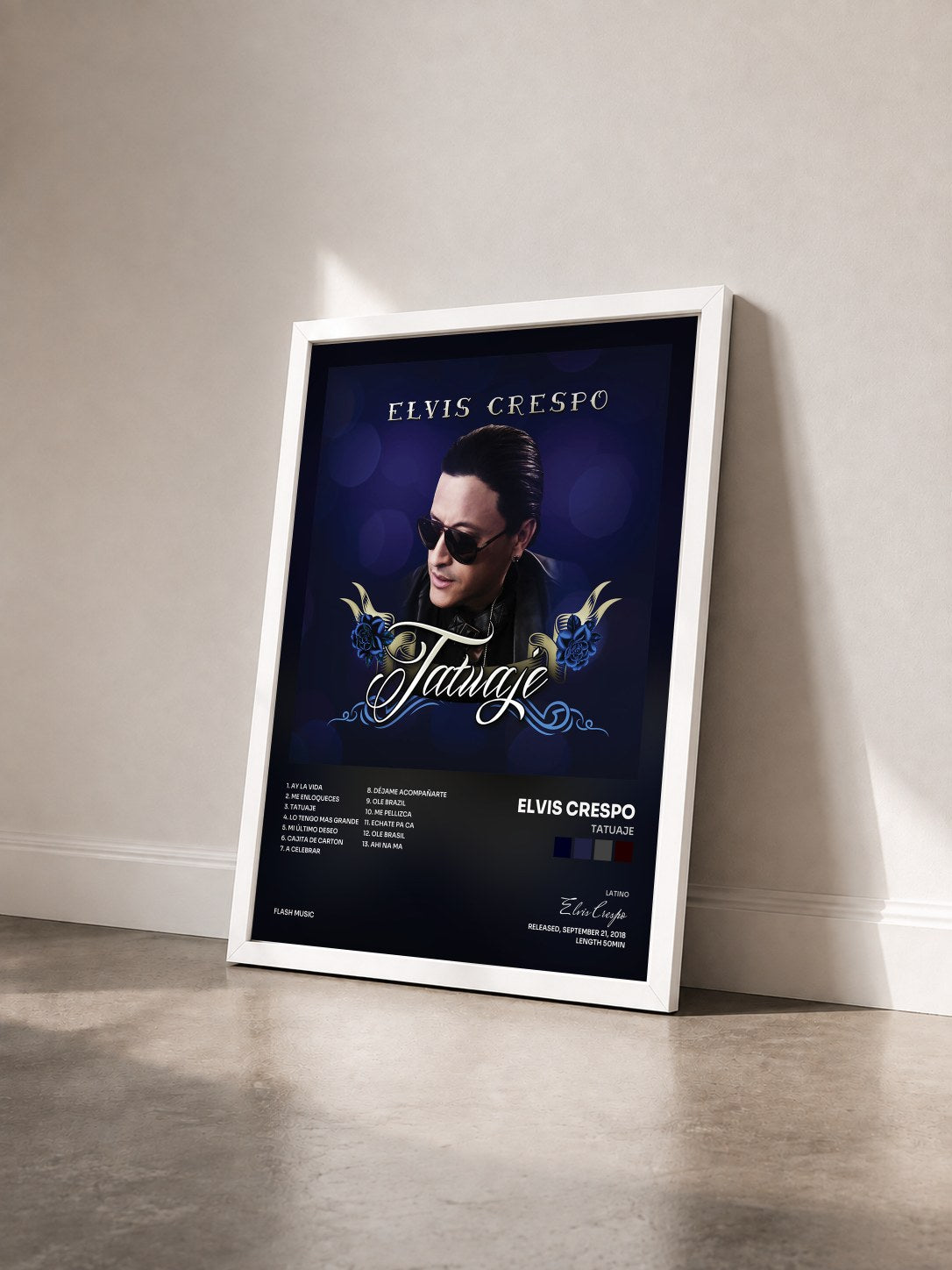 #blanc Tableau de l'album Tatuaje de Elvis Crespo vu de trois quarts, cadre blanc