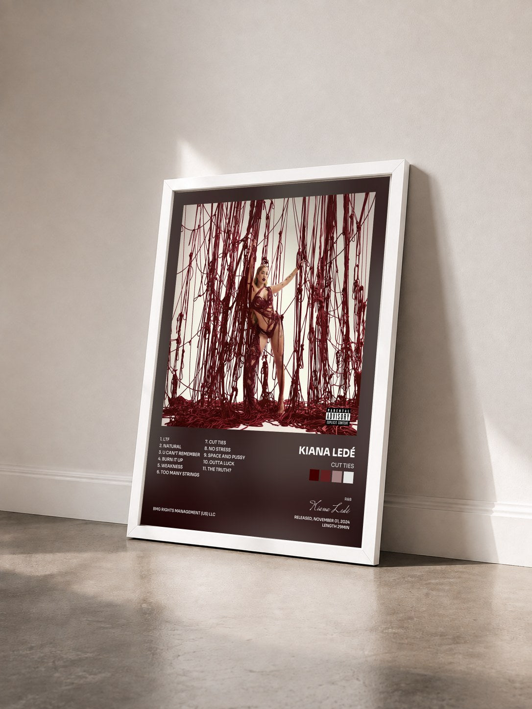 #blanc Tableau de l'album Cut Ties de Kiana Ledé vu de trois quarts, cadre blanc