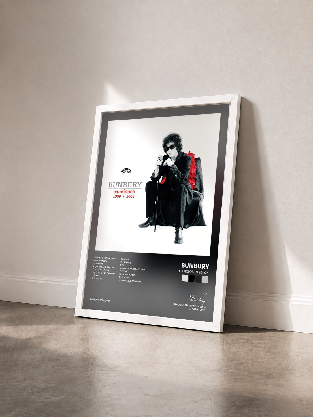 #blanc Tableau de l'album Canciones 96-06 de Bunbury vu de trois quarts, cadre blanc