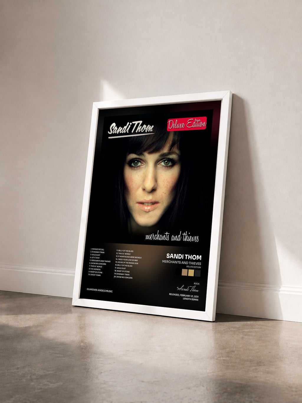 #blanc Tableau de l'album Merchants and Thieves (Deluxe Edition) de Sandi Thom vu de trois quarts, cadre blanc