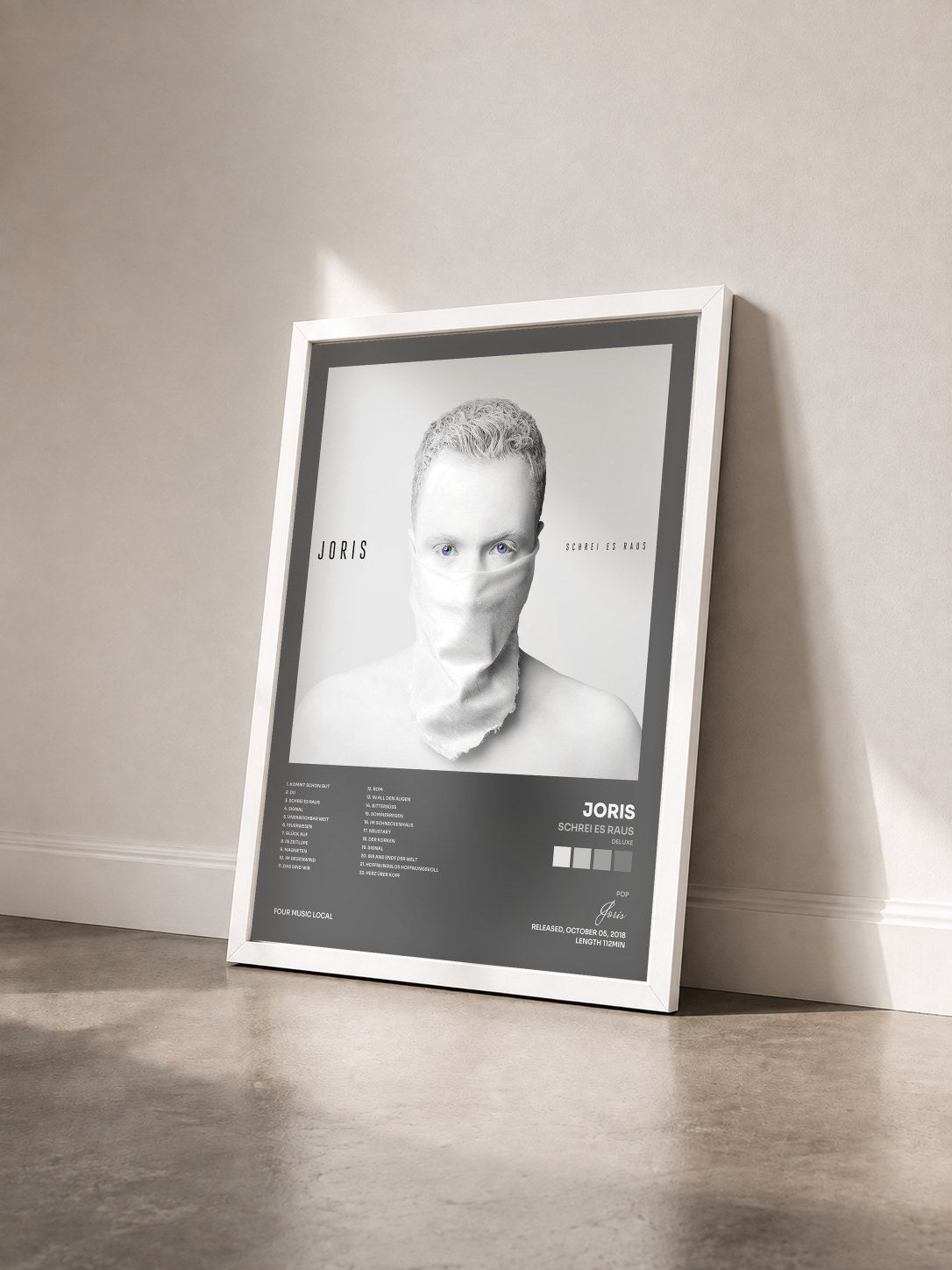 #blanc Tableau de l'album Schrei es raus (Deluxe) de Joris vu de trois quarts, cadre blanc