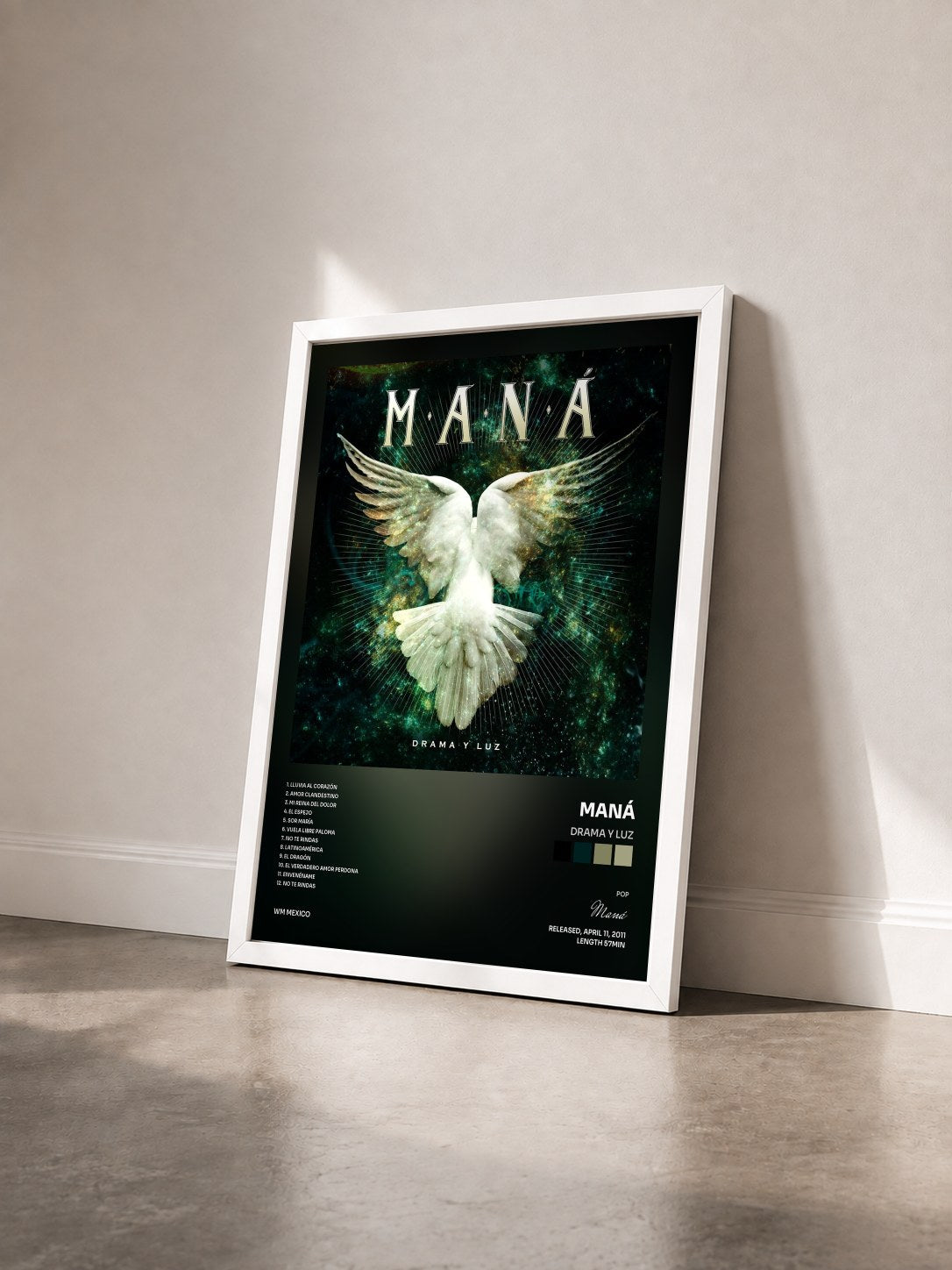 #blanc Tableau de l'album Drama Y Luz de Maná vu de trois quarts, cadre blanc