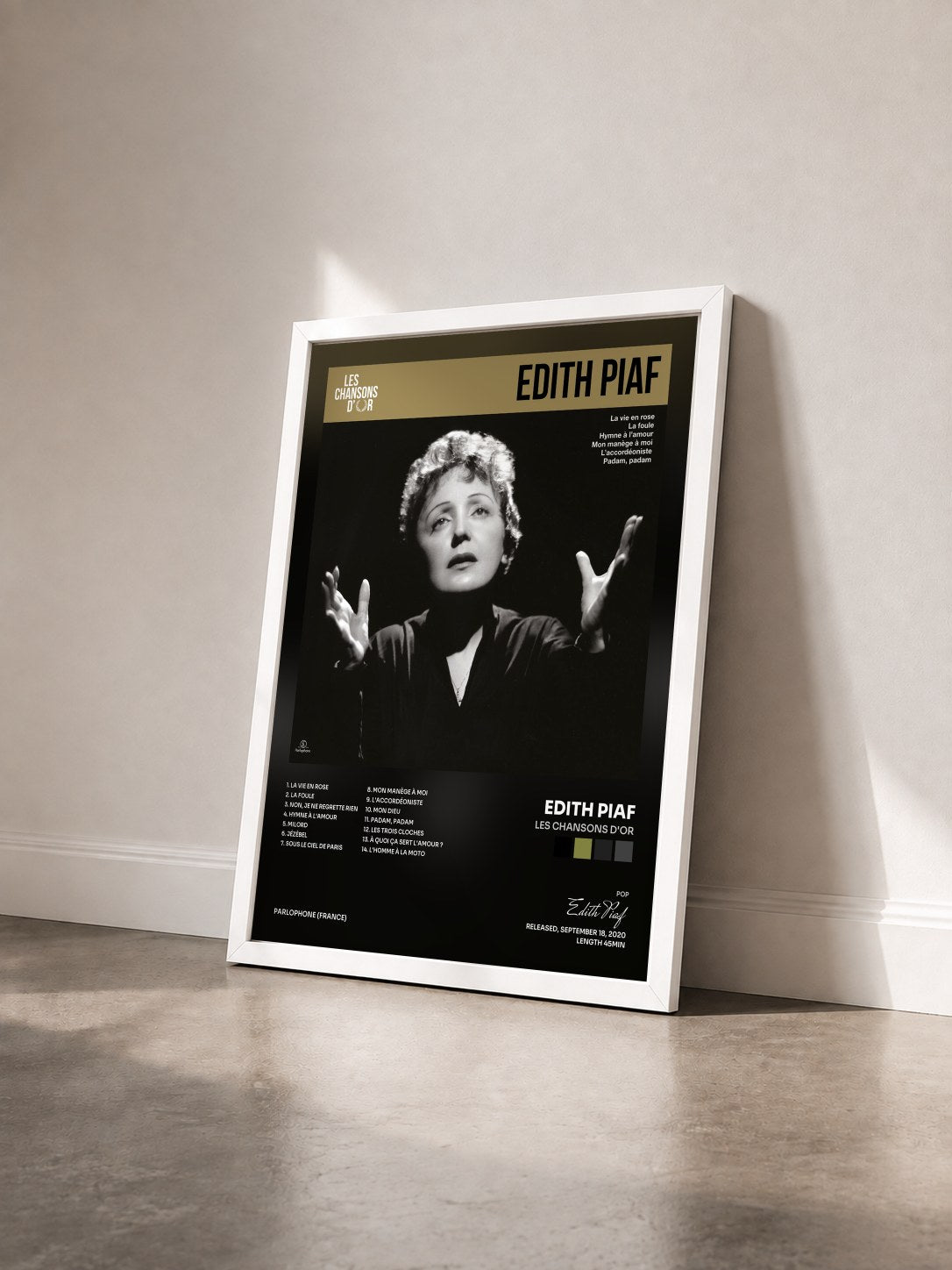#blanc Tableau de l'album Les chansons d'or de Edith Piaf vu de trois quarts, cadre blanc