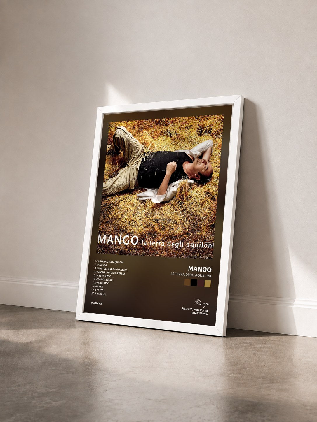 #blanc Tableau de l'album La terra degli aquiloni de Mango vu de trois quarts, cadre blanc