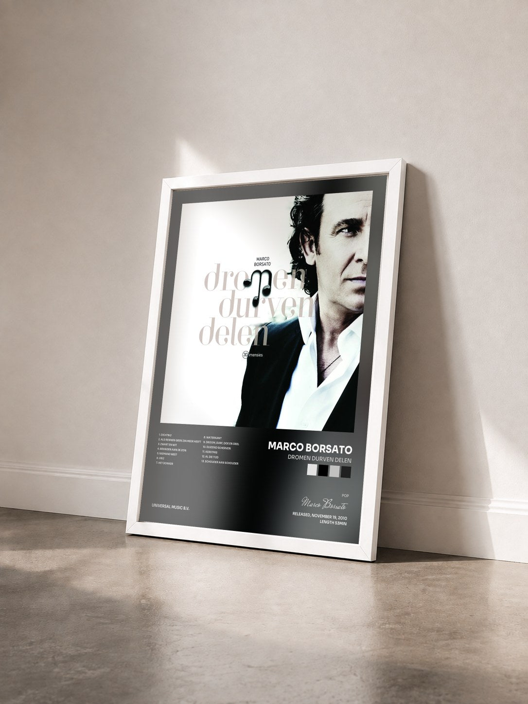 #blanc Tableau de l'album Dromen Durven Delen de Marco Borsato vu de trois quarts, cadre blanc