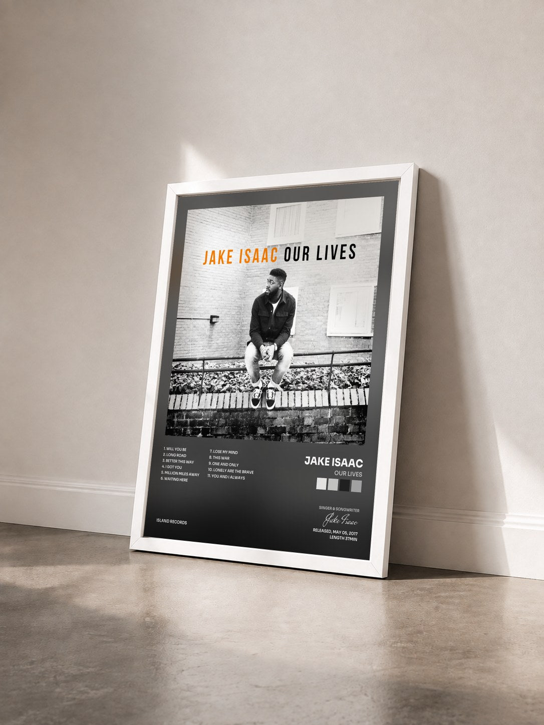 #blanc Tableau de l'album Our Lives de Jake Isaac vu de trois quarts, cadre blanc