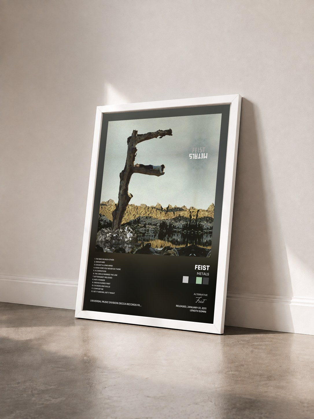 #blanc Tableau de l'album Metals de Feist vu de trois quarts, cadre blanc