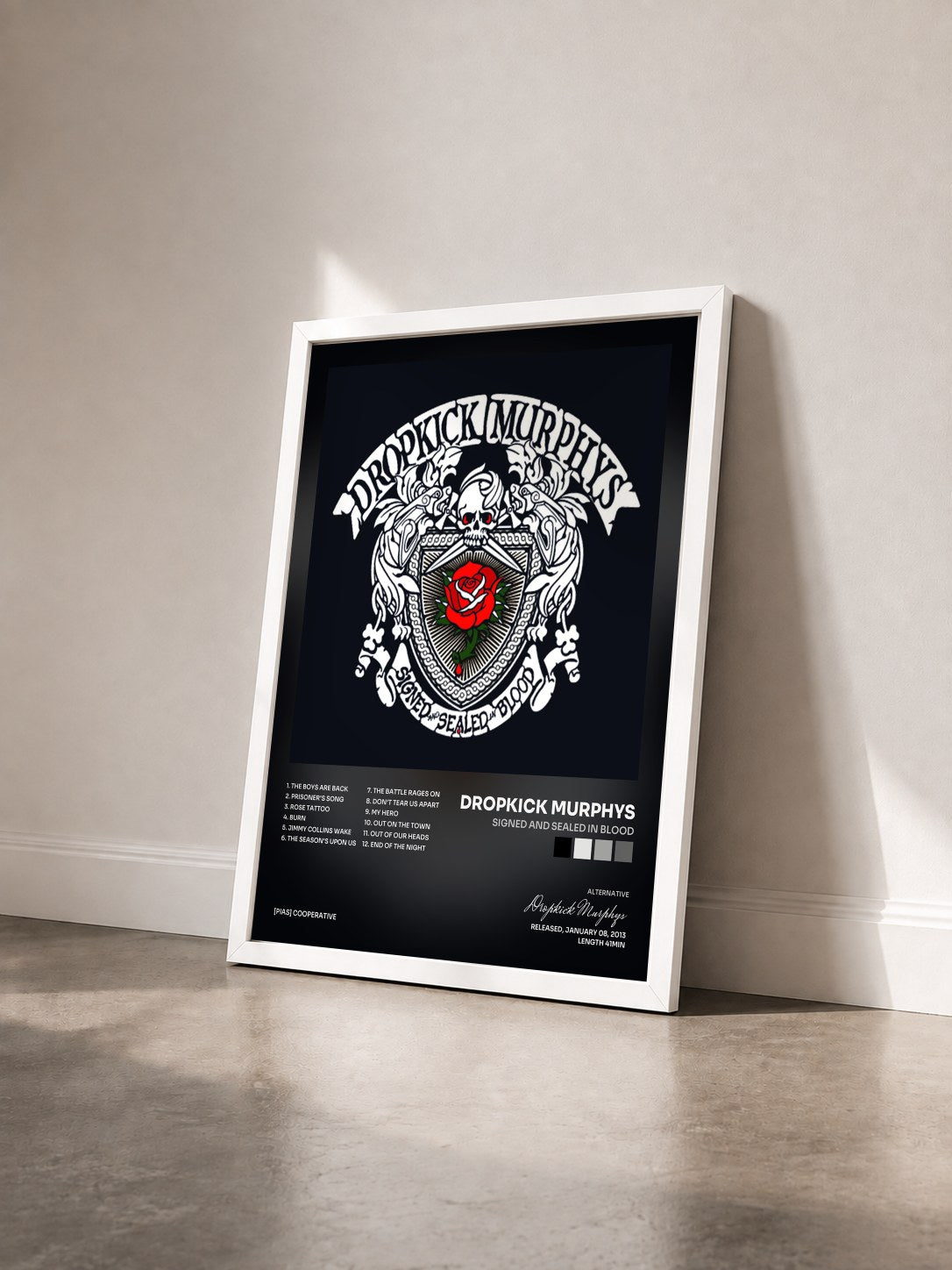#blanc Tableau de l'album Signed and Sealed In Blood de Dropkick Murphys vu de trois quarts, cadre blanc