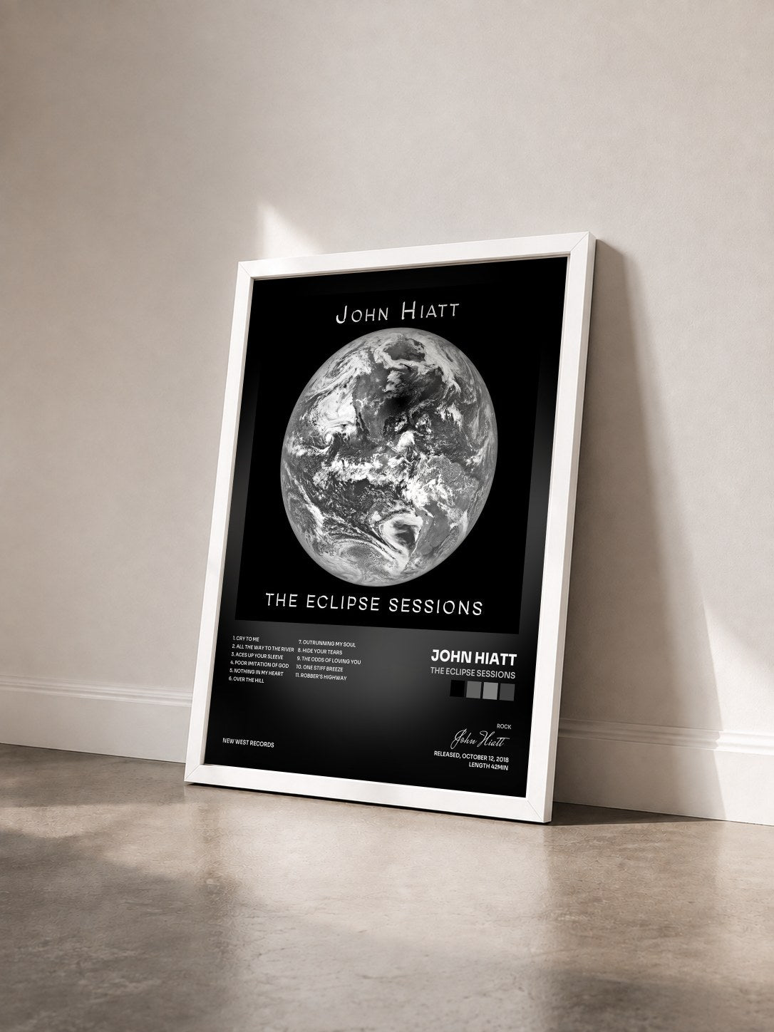 #blanc Tableau de l'album The Eclipse Sessions de John Hiatt vu de trois quarts, cadre blanc