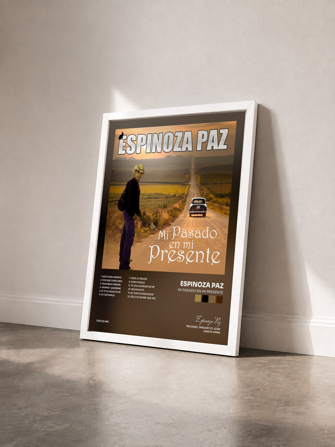 #blanc Tableau de l'album Mi Pasado en Mi Presente de Espinoza Paz vu de trois quarts, cadre blanc