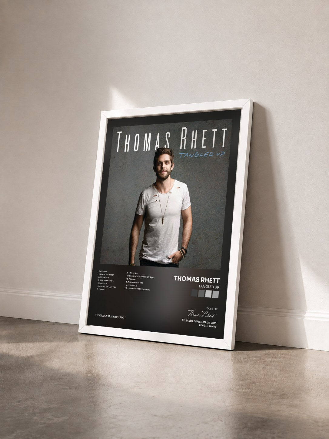 #blanc Tableau de l'album Tangled Up de Thomas Rhett vu de trois quarts, cadre blanc