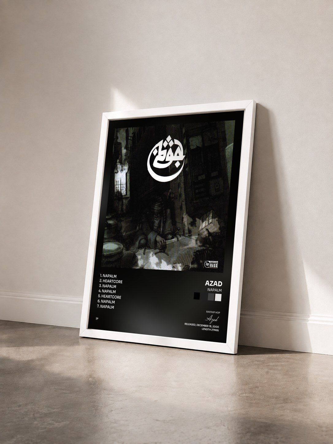 #blanc Tableau de l'album Napalm de Azad vu de trois quarts, cadre blanc