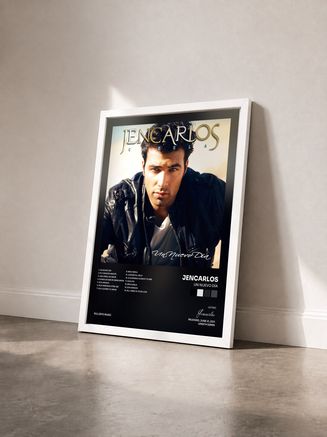 #blanc Tableau de l'album Un Nuevo Día de Jencarlos vu de trois quarts, cadre blanc