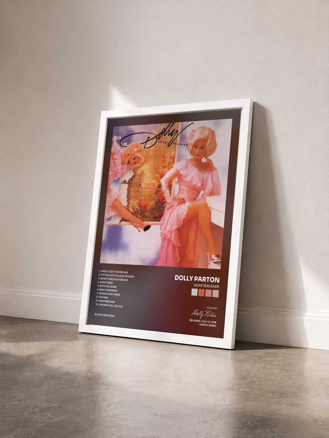 #blanc Tableau de l'album Heartbreaker de Dolly Parton vu de trois quarts, cadre blanc