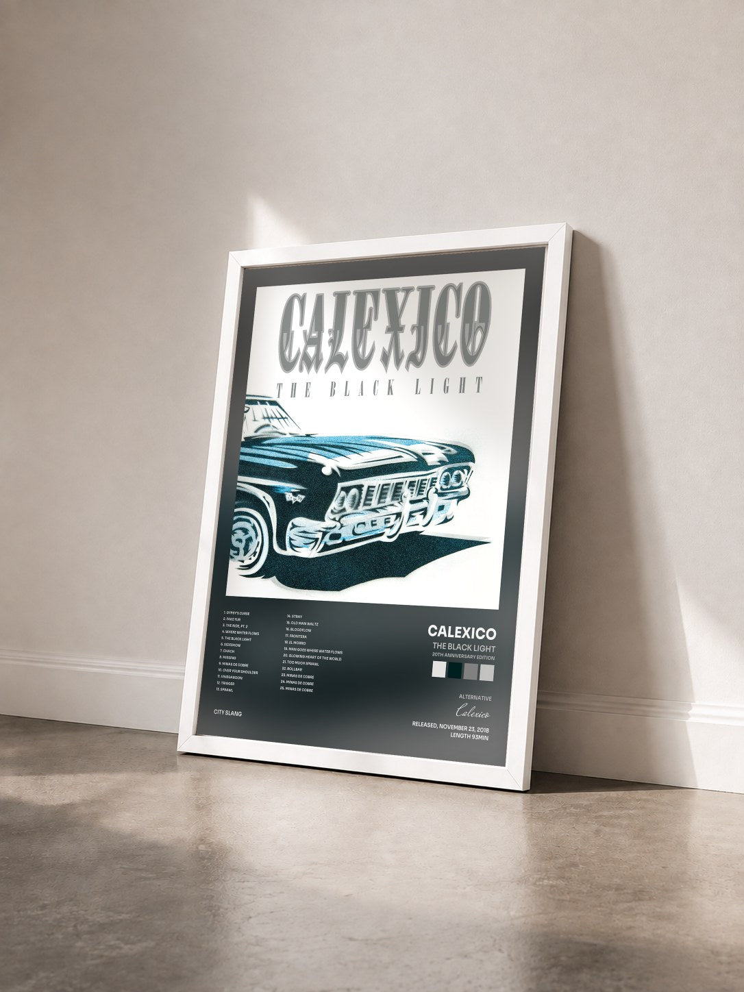 #blanc Tableau de l'album The Black Light (20th Anniversary Edition) de Calexico vu de trois quarts, cadre blanc