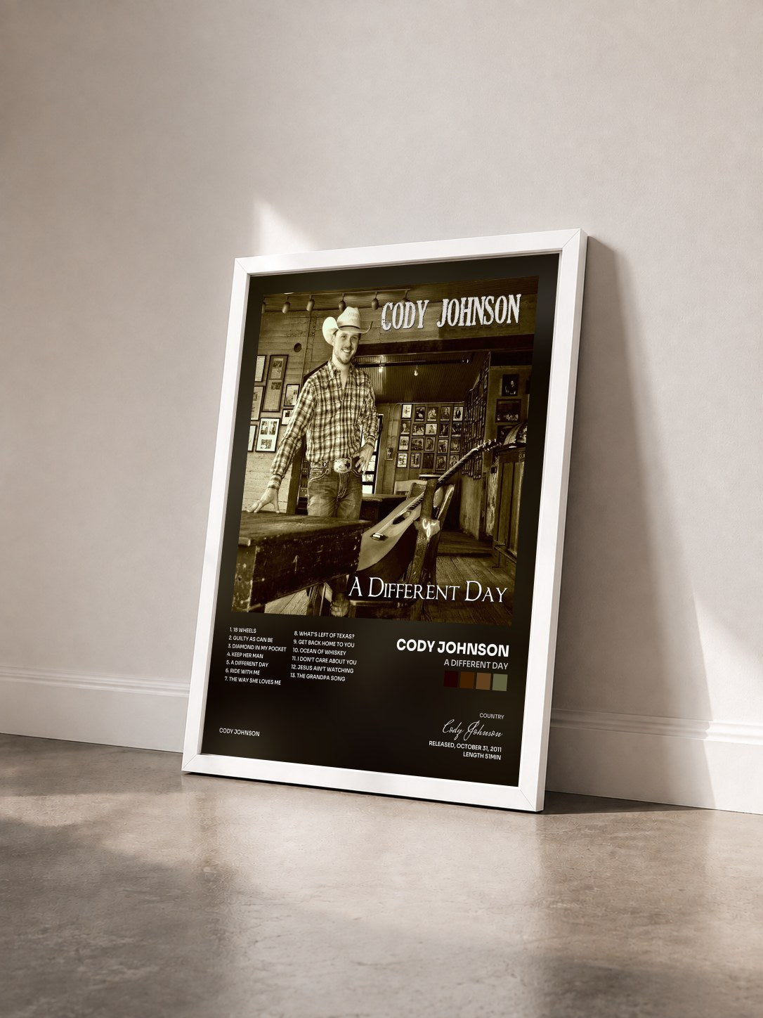 #blanc Tableau de l'album A Different Day de Cody Johnson vu de trois quarts, cadre blanc