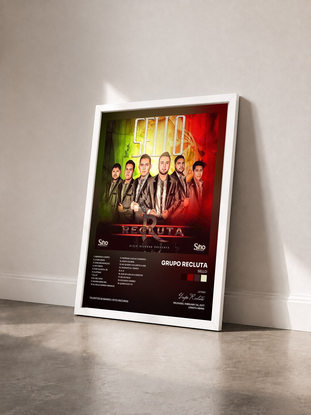 #blanc Tableau de l'album Sello de Grupo Recluta vu de trois quarts, cadre blanc