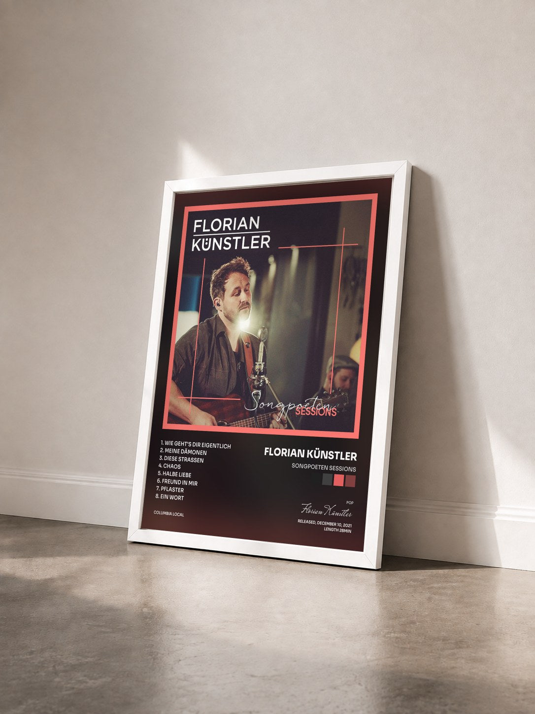 #blanc Tableau de l'album Songpoeten Sessions de Florian Künstler vu de trois quarts, cadre blanc